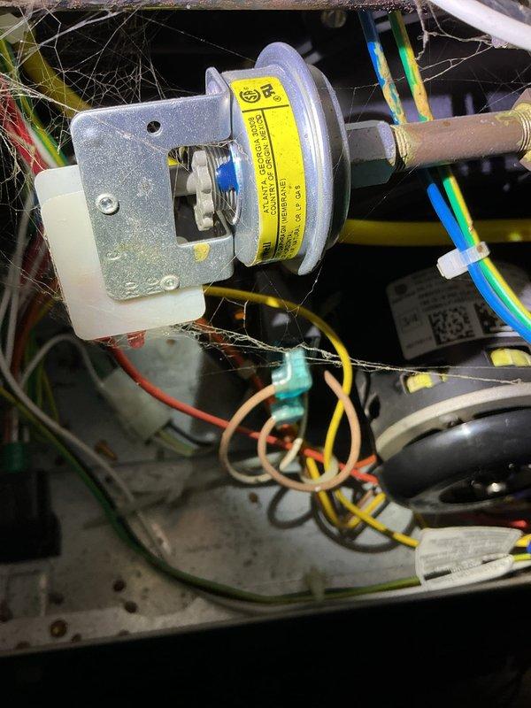 Responded to no heat call for a 5-year-old Tempstar furnace that failed to start. Diagnosed fault code 6+1 indicating a sticking gas valve. Tapped on gas valve to temporarily restore operation and observed system through multiple heating cycles to confirm diagnosis. Recommended gas valve replacement due to intermittent operation. Visual inspection revealed dust accumulation and cobwebs on pressure switch and control module components.