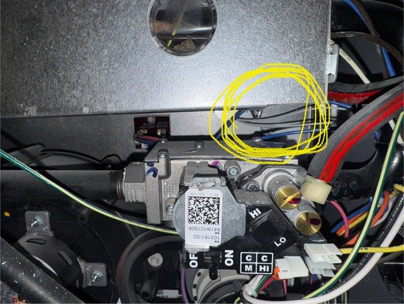 Responded to No Heat service call for a 4-5 year old Lennox natural gas system reporting error code E-205. Diagnosed issue with condensate drain line; found intake leaking with water backing up in-line drain. Cleared blockage in condensate system and verified proper drainage. System returned to normal operation after reset with no further error codes.