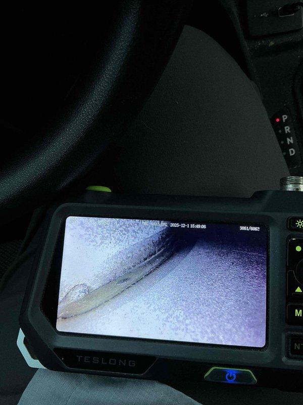 Responded to service call for no heat issue on 6-year-old natural gas furnace. Diagnosed loose wire connection on control board causing intermittent operation. Secured wire connection, verified proper operation through multiple heating cycles. Inspection with borescope revealed early-stage heat exchanger cracks at primary/secondary junction points. Homeowner advised of potential future safety concerns regarding carbon monoxide risk, though system remains operational at present.