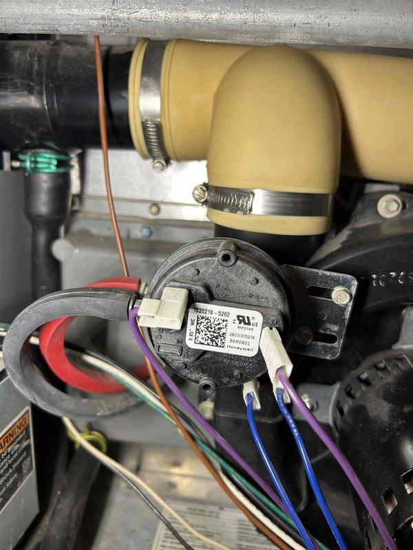 Diagnosed intermittent heating issue on 10+ year old natural gas furnace that was short-cycling and producing insufficient heat. Investigation revealed a faulty control board with visible corrosion damage at the base of the unit. Replaced control board to restore proper heating operation and discussed replacement options with customer due to system age.