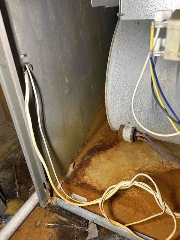 Diagnosed intermittent heating issue on 10+ year old natural gas furnace that was short-cycling and producing insufficient heat. Investigation revealed a faulty control board with visible corrosion damage at the base of the unit. Replaced control board to restore proper heating operation and discussed replacement options with customer due to system age.