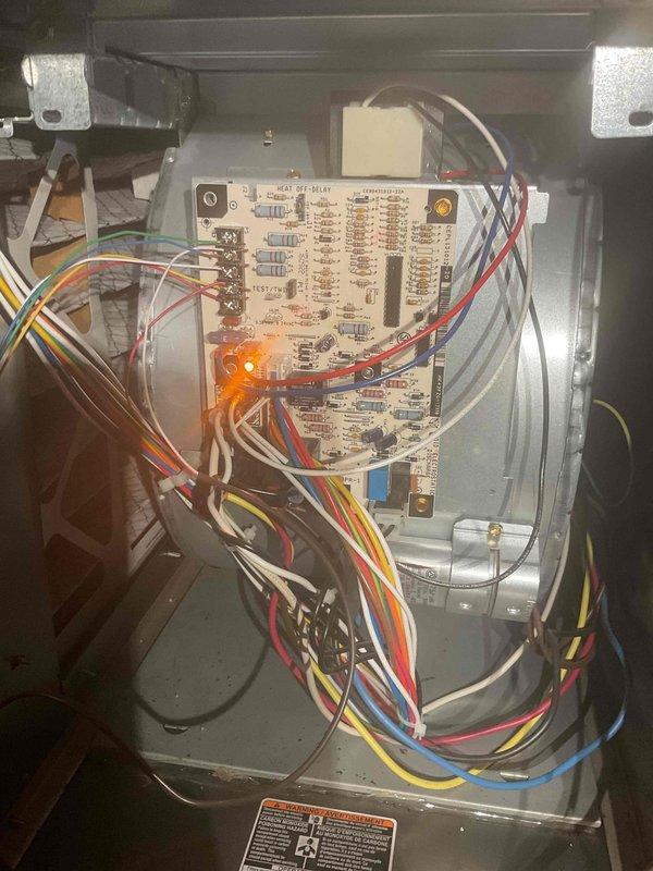 Performed scheduled bi-annual tune-up maintenance on 9-year-old HVAC system per service agreement. Inspected control board with heat/off relay and examined interior components including condensation chamber. System functioning properly with no issues detected.