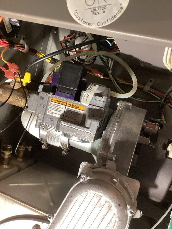 Performed scheduled membership maintenance visit on Lochinvar high-efficiency boiler system with three zones of baseboard heat. Inspected ignitor, flame sensor, inducer, and control board. Cleaned buildup from heat exchanger and checked burner functionality. Cycled system and verified combustion air in both high and low fire settings. Identified leaking air vent inside boiler requiring replacement; part has been ordered and will return for installation upon availability.