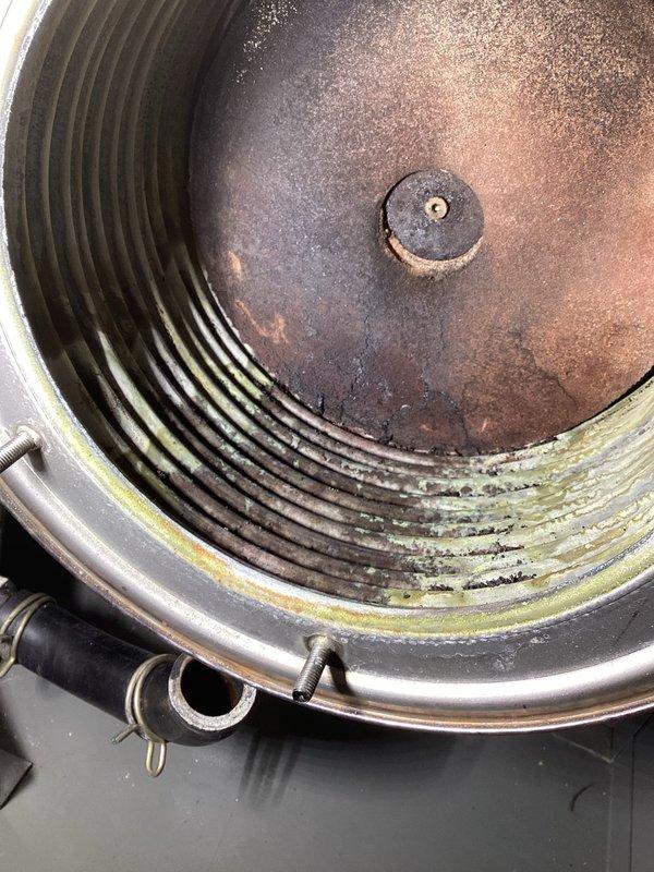 Performed scheduled membership maintenance visit on Lochinvar high-efficiency boiler system with three zones of baseboard heat. Inspected ignitor, flame sensor, inducer, and control board. Cleaned buildup from heat exchanger and checked burner functionality. Cycled system and verified combustion air in both high and low fire settings. Identified leaking air vent inside boiler requiring replacement; part has been ordered and will return for installation upon availability.