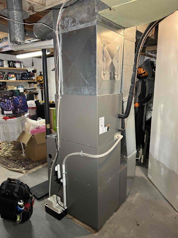 Performed annual furnace tune-up on 1-year-old FRP unit. Cleared condensate drain line and trap of accumulated debris and spiderwebs, verified proper operation of all critical components including inducer motor, capacitor, pressure switch, and control board connections. Combustion analysis showed CO at acceptable 13 ppm level, system operating within normal parameters with no immediate concerns.