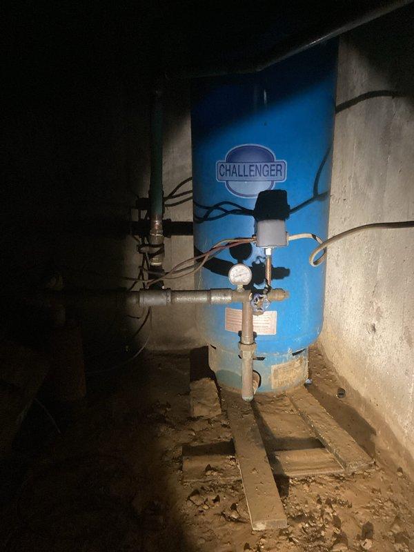 Responded to emergency call for leaking pipe. Diagnosed a hole in the pressure switch plate causing water to gush when well pump activated. Replaced the defective 40/60 pressure switch with a new unit, restoring proper function to the residential water system.