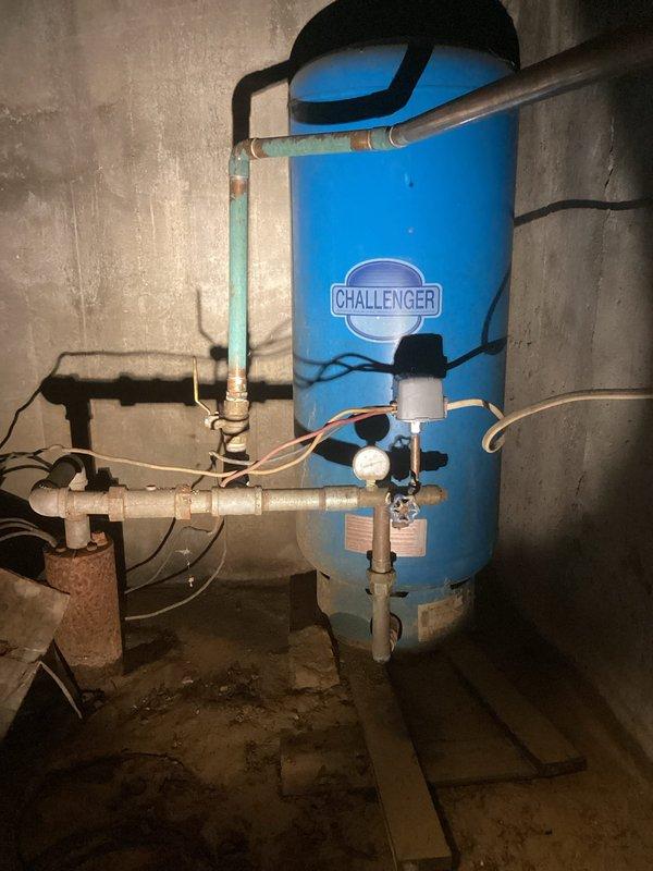 Responded to emergency call for leaking pipe. Diagnosed a hole in the pressure switch plate causing water to gush when well pump activated. Replaced the defective 40/60 pressure switch with a new unit, restoring proper function to the residential water system.