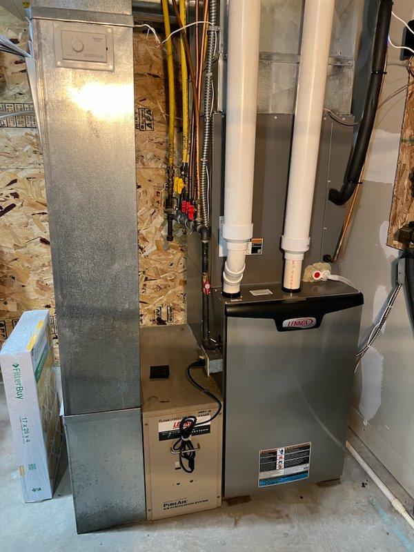 Performed comprehensive maintenance on residential HVAC system consisting of a Lennox forced air furnace and Weil-McLain CSST iron boiler for in-floor heating system. Completed full tune-up service on both late model units with no operational issues detected. All systems functioning properly with appropriate connections and venting verified.