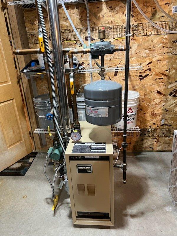 Performed comprehensive maintenance on residential HVAC system consisting of a Lennox forced air furnace and Weil-McLain CSST iron boiler for in-floor heating system. Completed full tune-up service on both late model units with no operational issues detected. All systems functioning properly with appropriate connections and venting verified.