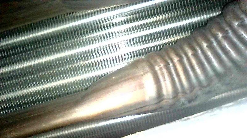 Responded to service call for 4-year-old furnace that would not turn on. Diagnosed pressure switch open code. Inspected and cleared pressure switch hoses, checked flame sensor, examined heat exchanger, verified condensate drainage, and confirmed air filter condition. After service, furnace operated normally with multiple test cycles, indicating likely blockage in pressure switch hose was cleared.