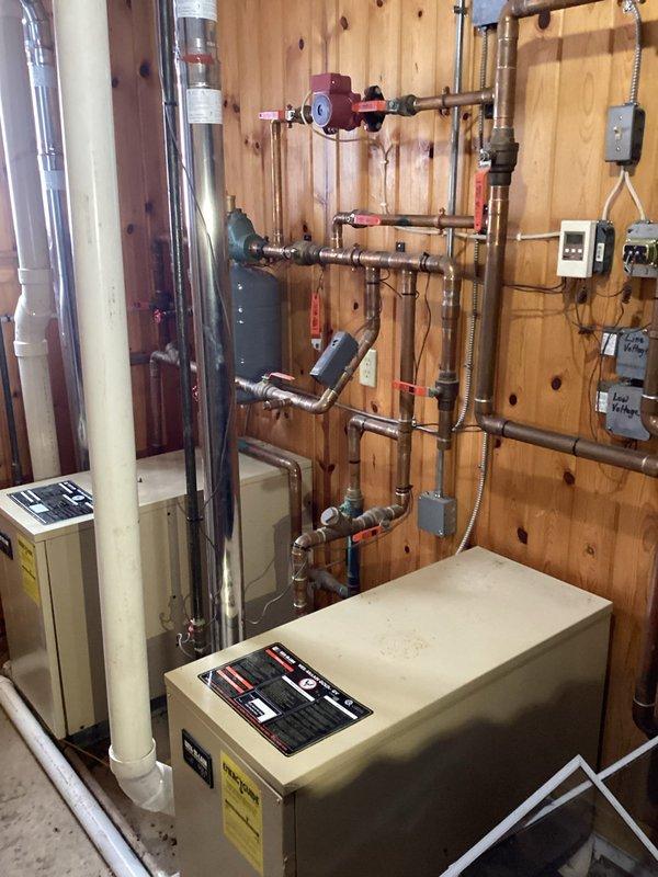 Successfully installed new Amtrol expansion tank as per approved estimate. System was refilled, air purged from lines, and proper operation verified after installation. All work completed according to specifications with residential hydronic heating system now functioning correctly.