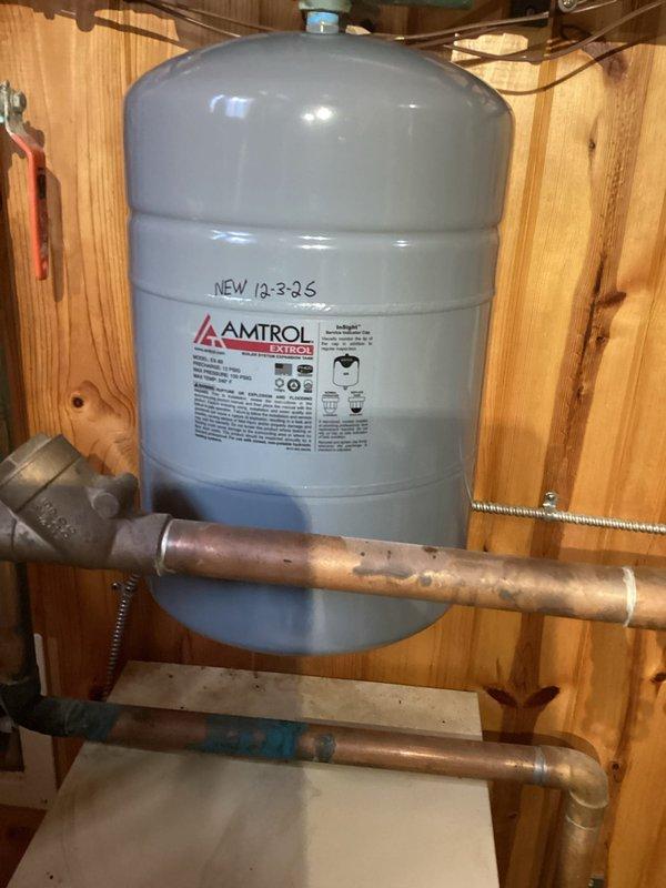 Successfully installed new Amtrol expansion tank as per approved estimate. System was refilled, air purged from lines, and proper operation verified after installation. All work completed according to specifications with residential hydronic heating system now functioning correctly.