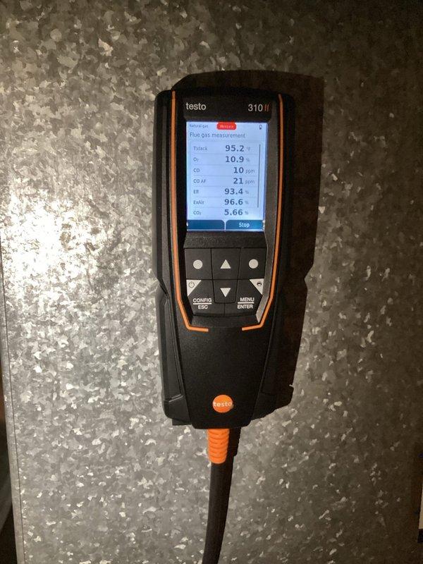 Performed annual tune-up on 2-year-old Lennox furnace. Comprehensive maintenance included cleaning/tightening components, verifying all operational elements (burner, igniter, flame sensor, blower, filter, thermostat, safety controls), and confirming proper combustion with Testo analyzer (CO: 10ppm, efficiency: 93.4%). All electrical measurements, gas pressures, and temperature parameters tested within manufacturer specifications. Condensate drain verified clear and system left operating properly.