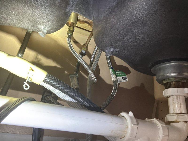 Conducted comprehensive inspection of existing plumbing system, focusing on calcium buildup issues in kitchen fixtures. Examined bathroom plumbing components including chrome shutoff valves, braided supply lines, and under-sink PVC drainage assembly. Provided customer with recommendations for addressing mineral deposits and prepared estimates for replacement of kitchen and bathroom faucets with customer-supplied fixtures and toilet internal components.