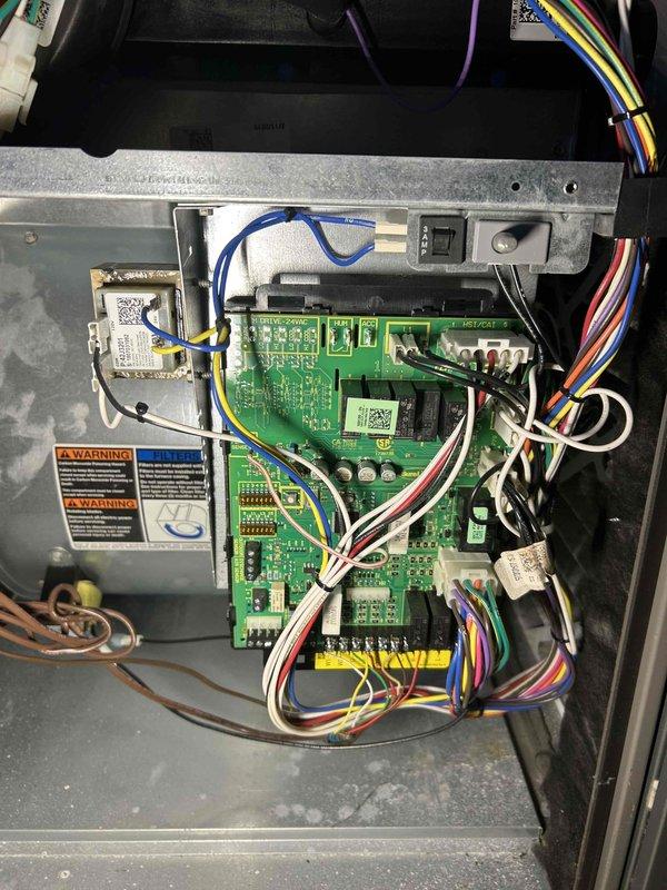Performed comprehensive preventative maintenance on dual furnace system. Cleared condensate drain line and trap of accumulated debris, verified all major components (inducer motor, capacitor, pressure switch, control board connections) functioning properly, and confirmed normal combustion with CO level of 11 ppm. Both units operating efficiently with moderate filter condition and no immediate concerns identified.