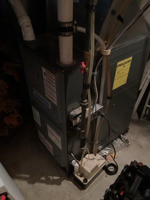 Responded to service call for furnace with intermittent operation and B4 error code (blower motor tripped/lost rotor). Performed comprehensive system inspection and tune-up including flame sensor cleaning, condensate drainage verification, and electrical component testing. Visual inspection of blower assembly, air filter, and heat exchanger revealed no current issues. System was operational during visit with no faults detected. Advised homeowner that intermittent issue likely related to either ECM blower motor or control board communication failure.