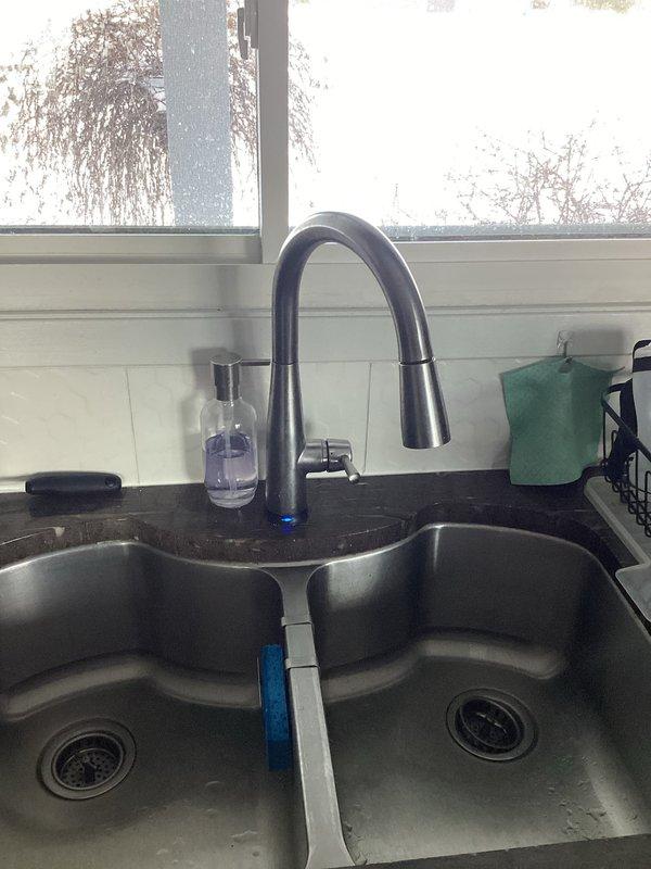 Responded to callback regarding no water pressure at kitchen faucet after previous installation of hot water valve shutoffs. Diagnostic testing revealed adequate pressure at shutoffs but restriction within either supply lines or faucet cartridge. Determined issue was unrelated to previous valve installation. Customer opted to replace faucet cartridge independently.