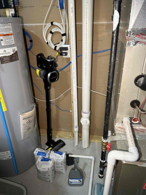 Completed furnace tune-up maintenance per annual service agreement. Performed comprehensive system inspection including gas pressure verification, heat exchanger examination, and carbon monoxide testing with all readings within normal parameters. Cleaned flame sensor, burners, and orifice; inspected supply/return vents. Noted potential heat loss issues due to 16+ foot ceilings and undersized system (50,000 BTU for 2,600 sq.ft home). Recommended dehumidifier installation to improve comfort on basement level.