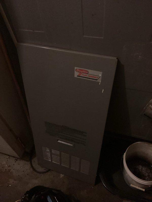 Responded to no-heat call for dual LP furnace system. Diagnosed dirty flame sensor on upstairs unit which was cleaned and heat exchanger inspected. Found failing blower motor on basement unit that required manual intervention to restart. Provided customer with replacement options for the basement furnace blower motor.