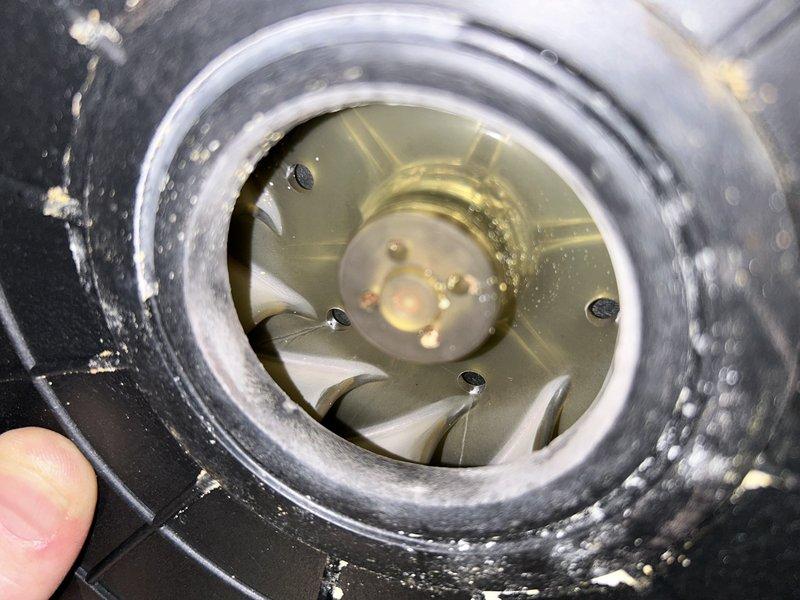 Diagnosed 20+ year old natural gas furnace with intermittent operation and insufficient heating. Inspection revealed inducer motor running hot with excessive amp draw due to cracked/damaged wheel assembly. Removed and inspected inducer assembly, confirming significant impeller damage with contamination present in housing. Recommended replacement of inducer assembly or complete furnace replacement based on equipment age and condition.