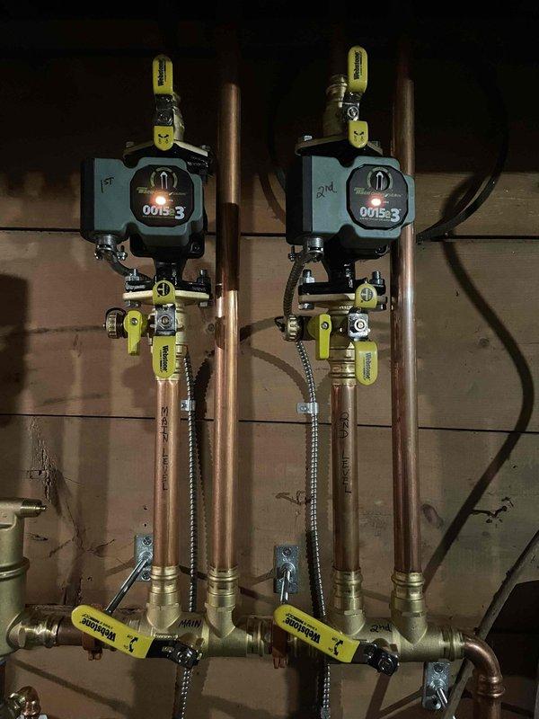 Responded to callback for insufficient heat on 2nd level. Diagnostic testing revealed inadequate temperature transfer between primary loop (180°) and secondary loops (only reaching approximately 110° at registers). Inspected closely-spaced tees causing flow turbulence and poor hydraulic separation. Attempted bleeding the system with minimal air discharge, confirming a flow design issue rather than air entrapment. Consulted with management regarding potential repiping solution to increase distance between tee sets for proper hydraulic separation.