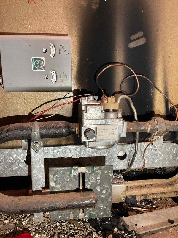 Responded to no-heat call for second-floor zone. Inspected 30-40 year old horizontal Fraser-Johnston furnace located in attic. Diagnostic examination revealed multiple cracks and possible perforations in heat exchanger. System deemed unsafe for operation and red-tagged due to carbon monoxide hazard. Customer advised to replace unit.