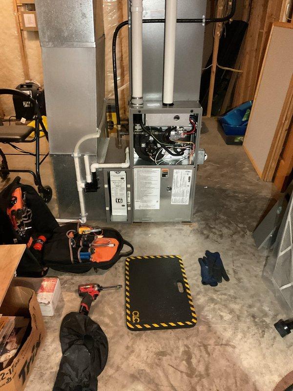 Performed annual furnace tune-up on 2-year-old Heil furnace as scheduled. Conducted comprehensive system inspection including blower motor, control board, electrical connections, and ventilation system. All components functioning properly with no issues detected. Visual inspection confirmed proper installation of PVC exhaust pipes and ductwork connections. System left in excellent operating condition.