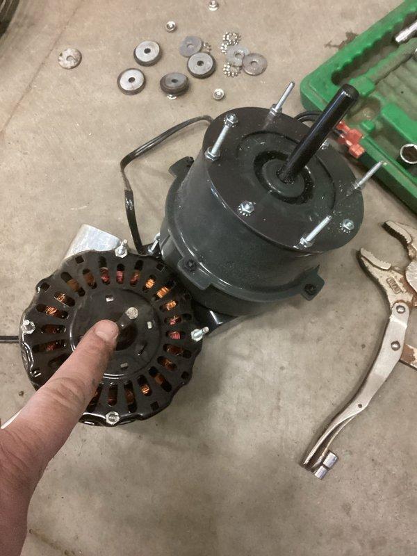 Responded to unit heater service call to install new fan motor. Upon arrival, determined that the replacement motor had a larger diameter shaft than the original, making the existing fan blade incompatible. Documented the issue with photographs of both the fan assembly and motor components. Submitted parts order form for the correctly sized replacement motor.