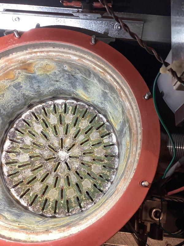 Completed service maintenance on two 5-year-old IBC boilers and two furnaces (3 and 5 years old). Performed comprehensive tune-up, checked operational status of all equipment, and verified proper functionality. No performance issues identified during inspection despite observed mineral buildup on heat exchanger components.