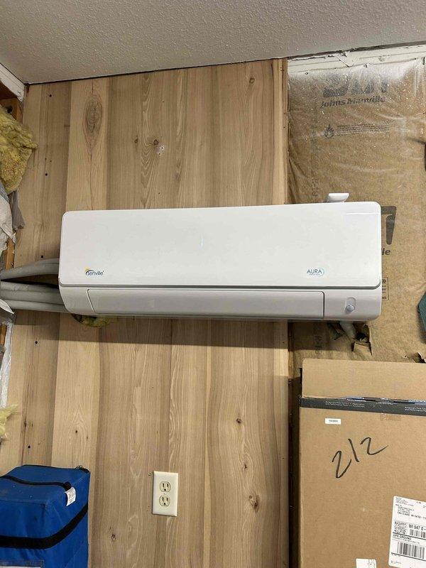 Diagnosed communication failure on garage mini-split system displaying E1 error code between indoor and outdoor units. Inspection revealed non-functioning outdoor main board with no LED indicators despite verified power supply. Documented stripped main ground wire terminal. Initiated parts procurement process for replacement main board to restore system functionality.