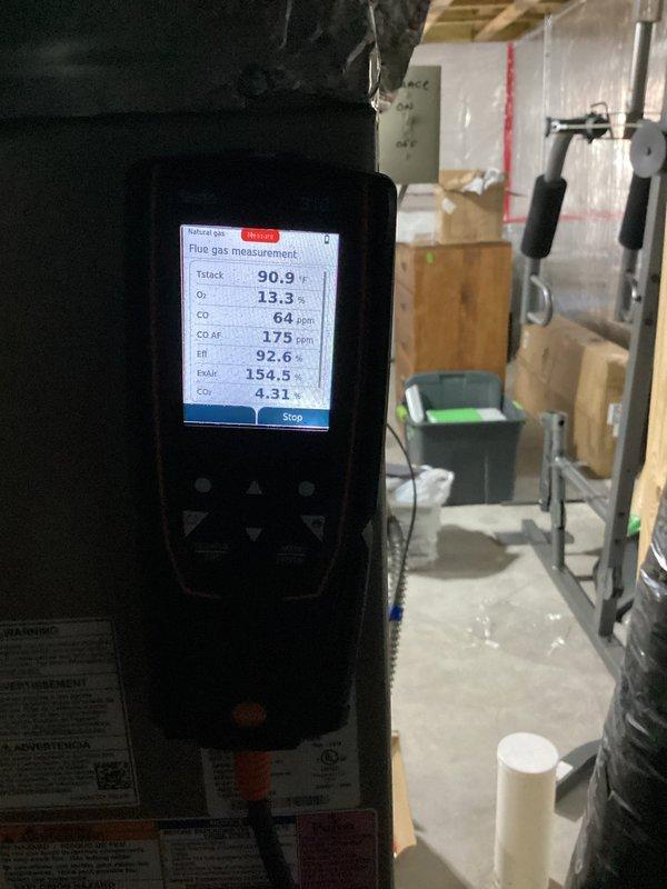 Performed routine maintenance inspection on 14-year-old Bryant furnace with combustion analysis showing 92.6% efficiency and 64 ppm CO in flue gas. Noted heat exchanger has significant rust and flaking, indicating age-related deterioration. System is currently operating safely but recommend planning for equipment replacement due to increased risk of future failure.