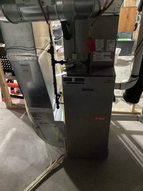 Performed routine maintenance inspection on 14-year-old Bryant furnace with combustion analysis showing 92.6% efficiency and 64 ppm CO in flue gas. Noted heat exchanger has significant rust and flaking, indicating age-related deterioration. System is currently operating safely but recommend planning for equipment replacement due to increased risk of future failure.