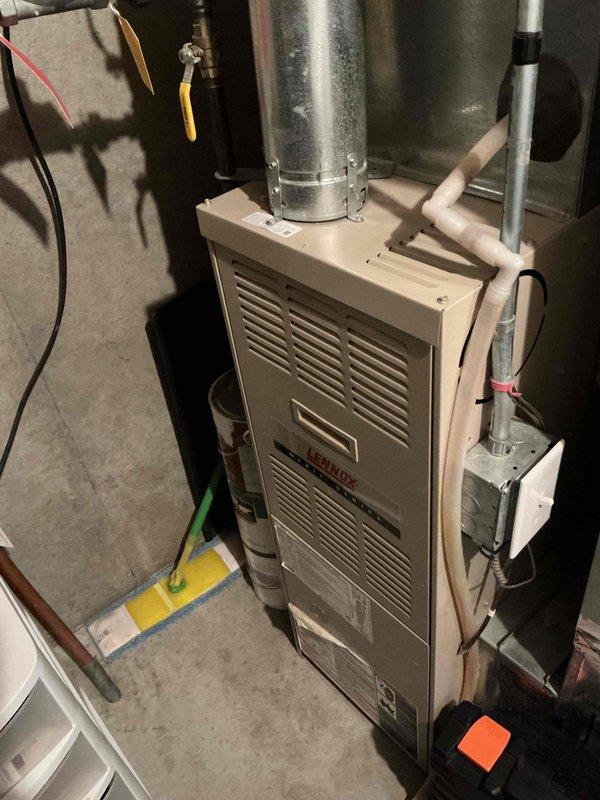 Responded to no-heat call on 22-year-old Lennox furnace. Diagnosed weak flame sensor preventing sustained ignition. Replaced flame sensor, restoring normal operation. Inspection revealed beginning signs of heat exchanger deterioration with potential pinholes forming. All other components functioning properly. Scheduled follow-up with service advisor to discuss system replacement options.