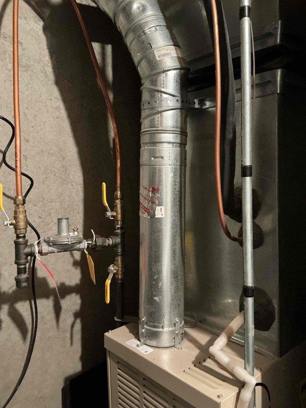 Responded to no-heat call on 22-year-old Lennox furnace. Diagnosed weak flame sensor preventing sustained ignition. Replaced flame sensor, restoring normal operation. Inspection revealed beginning signs of heat exchanger deterioration with potential pinholes forming. All other components functioning properly. Scheduled follow-up with service advisor to discuss system replacement options.