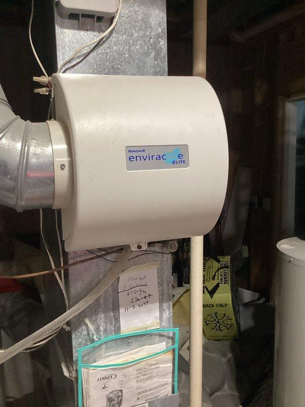 Replaced humidifier valve on Honeywell Envirac Elite whole-house humidifier and installed three humidifier shutoffs, including a yellow-handled shutoff valve on copper piping. Service required approximately one hour to complete using parts from the Hud/Keeyan van.