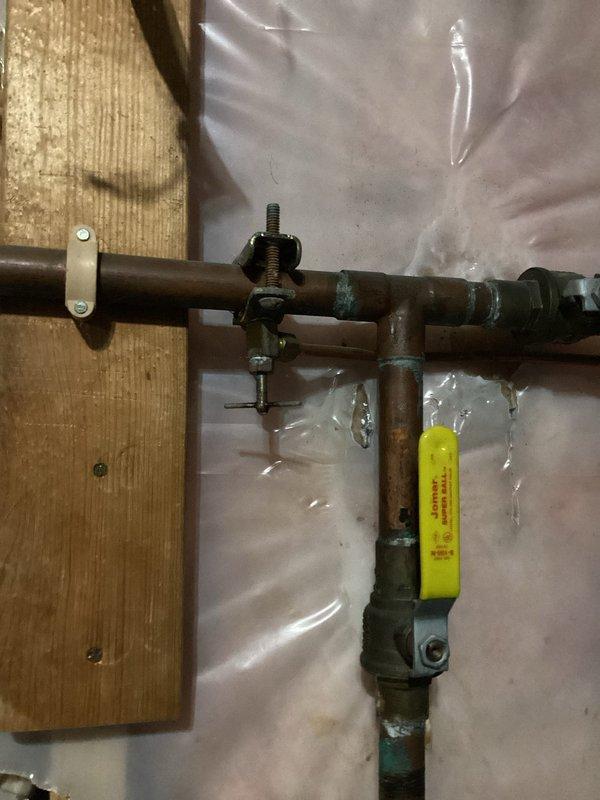 Replaced humidifier valve on Honeywell Envirac Elite whole-house humidifier and installed three humidifier shutoffs, including a yellow-handled shutoff valve on copper piping. Service required approximately one hour to complete using parts from the Hud/Keeyan van.