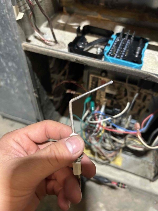 Performed furnace tune-up on 29-year-old FRP unit. Detected elevated carbon monoxide levels (25 ppm). After inspection revealed no cracks or holes in heat exchanger, cleaned flame sensor and removed debris from burners and orifice which resolved initial flame failure issue. Installed carbon monoxide/gas detectors on both floors and recommended regular filter changes every 3 months. Noted rusty burners and oily spots on blower motor for future monitoring; estimate sent for replacement parts.