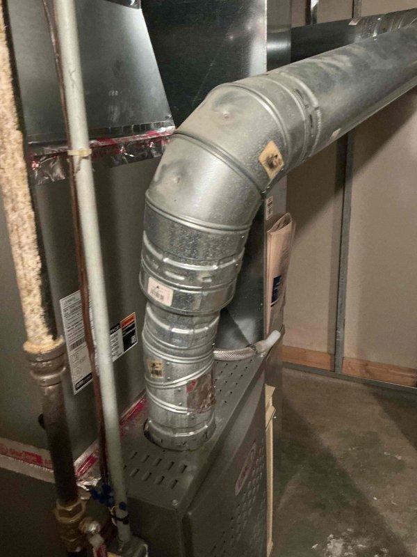 Responded to airflow concerns where certain vents had reduced heat output in a one-year-old furnace system. Diagnostic testing confirmed adequate furnace performance (118°F output) and proper airflow through all vents. Determined the issue was due to heat loss in ductwork running through uninsulated exterior wall sections. Adjusted fan speed as troubleshooting measure, then reverted to original settings when improvement wasn't observed. Recommended additional insulation around affected ductwork to resolve temperature inconsistencies.