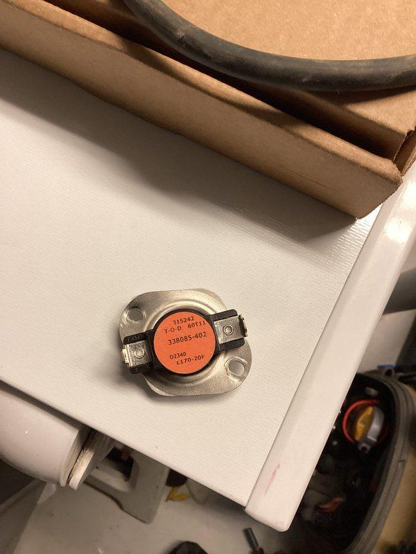 Diagnosed furnace shutting down prematurely due to overheating condition. Adjusted speed tab configuration for optimal airflow and set gas pressure to 1.5" WC on low fire and 2.9" WC on high fire. Testing revealed temperature limit switch was defective, tripping at 108°F (below 120°F threshold). Replacement limit switch (P/N 338085-402) ordered; will return to complete repair and verify proper operation.