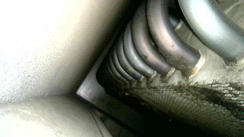 Responded to no-heat complaint at multi-unit residence. Identified two problematic rooms with temperature issues. For NW room, discovered unused baseboard heater and activated it to supplement inadequate airflow. For SE room, inspected furnace operation (functioning properly) but found thermostat set 3° lower than other zones; adjusted setpoint to match building standard. Additionally, observed fresh air damper fully open during blower operation, allowing excessive cold air intake; adjusted damper to 50% capacity to improve overall heating performance and balance.