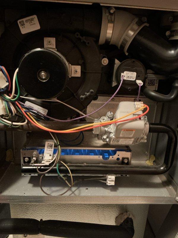 Responded to no heat call for 9-year-old Lennox furnace with pressure switch lockout (6 flashing lights). Upon arrival, furnace was operational with signs of possible condensate drainage issues. Cleared condensate trap and vacuumed excess water. Suspect prior temporary shutdown due to possible frost buildup on roof exhaust termination that had since melted. Confirmed system was functioning properly and providing heat before departure.