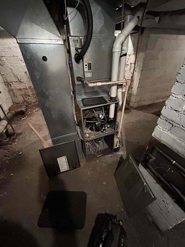 Responded to no heat complaint on 9-year-old furnace where thermostat was operational but temperature continued to drop. Diagnosed and corrected system failure due to tripped open limit switch caused by severely plugged filter. Replaced filter, verified proper operation for 15 minutes, and advised customer to replace filter every 2-3 months using maximum MERV 8 rated filters to prevent recurrence.