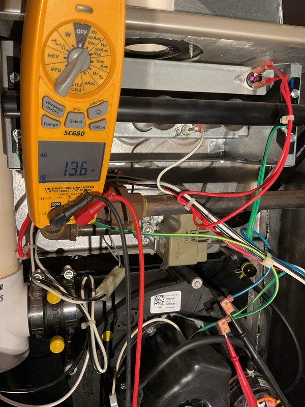 Responded to no-heat call for 15-year-old natural gas furnace exhibiting startup failure and inoperative fan. Diagnosed issue as sticking gas valve, which was corrected with manual adjustment. Performed comprehensive inspection including heat exchanger evaluation, flame sensor cleaning, and visual examination of AC coil. System functioning properly upon completion.