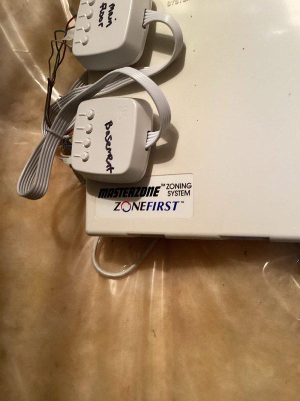 Diagnosed issue with 5-year-old two-zone HVAC system where basement zone damper was failing to close when temperature set point was reached. Replaced defective zone motor and damper, ensuring proper alignment during installation to prevent recurrence of the issue. System now functioning properly with ZoneFirst control modules correctly managing both zones.