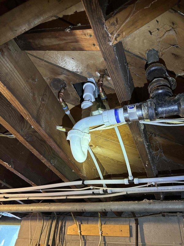 Responded to service call regarding no water supply to shower after a recent repipe. Inspection revealed shower was not connected to main water lines. Successfully installed and connected new plumbing lines from shower to existing water supply, including proper P-trap drain configuration. Service restored full water functionality to shower fixture.