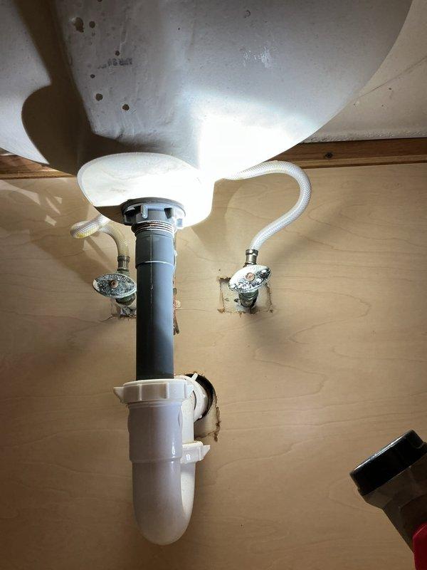 Replaced bathroom faucet with a taller model as requested, installing new hot/cold shut off valves and water supply lines. Verified proper installation with no leaks in the drainage system and confirmed full functionality of the new fixtures.