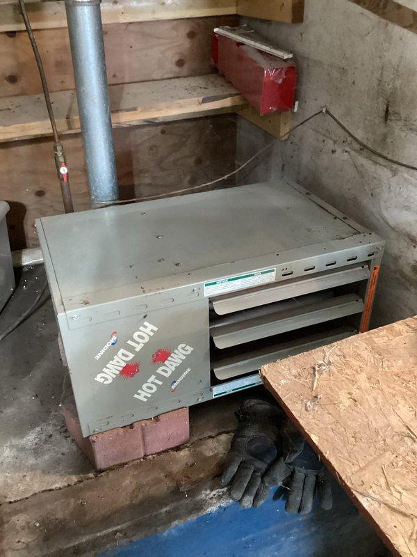 Diagnosed Hot Dawg heater with pressure switch error code causing intermittent operation. Found plugged pressure switch hose, cleared obstruction and restored proper pressure sensing. Performed comprehensive system inspection with all components verified in specification. Unit now functioning properly with normal heating operation.