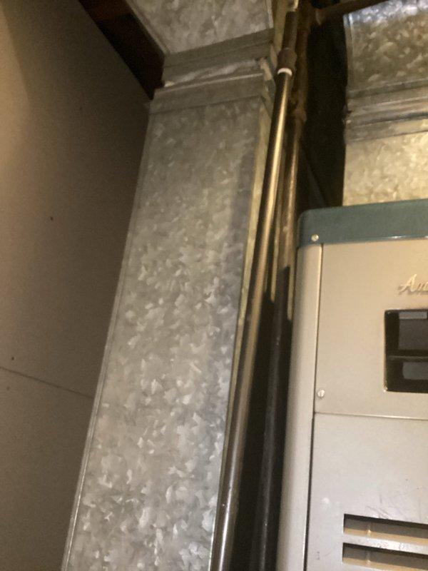 Responded to a gas leak service call where customer had gas shut off to home due to leak from corner joint. Upon inspection, found faulty main brass core valve was the source of the leak. Removed old damaged valve and installed new replacement valve. Performed pressure test after installation to verify repair integrity and confirm no further gas leaks present.