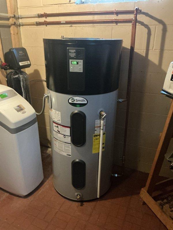 Responded to service call for an A.O. Smith hybrid water heater displaying ECC error code, a recurring issue since installation approximately one year ago. Performed system reset and contacted manufacturer's technical support for assistance. Visual inspection confirmed proper installation with no visible leaks or damage to unit or connecting components.