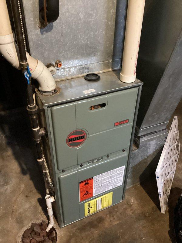 Diagnosed and repaired a 35-year-old Ruud furnace that was intermittently heating and shutting down prematurely. Identified malfunctioning pressure switch that was consistently clicking and opening above its setpoint as the root cause of system failure. Replaced pressure switch with new component having correct specifications, which restored reliable operation and proper heating cycle completion. System tested and verified operational.